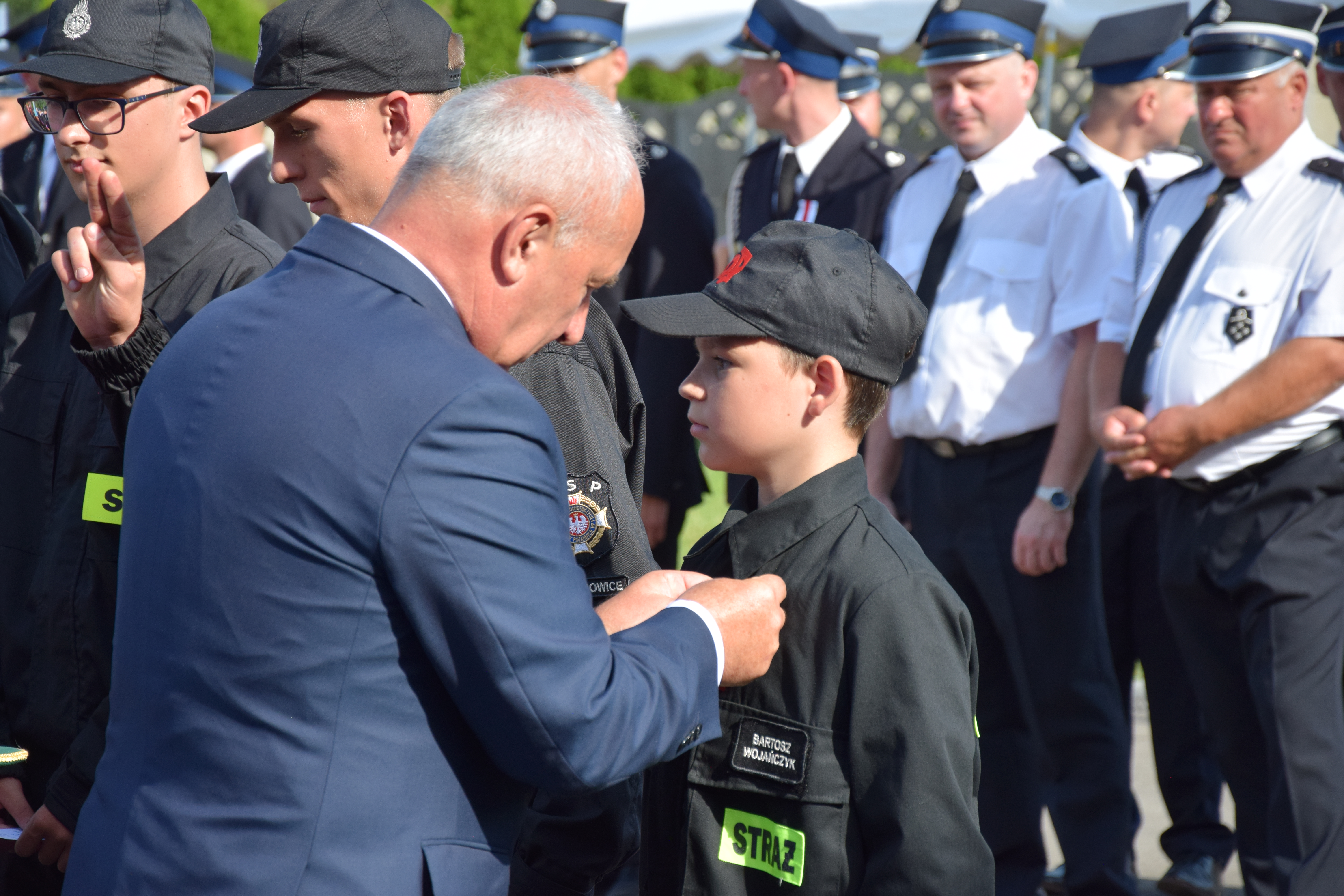 Zdjęcie przedstawia uczestników Jubileuszu 100-lecia OSP Toporowice