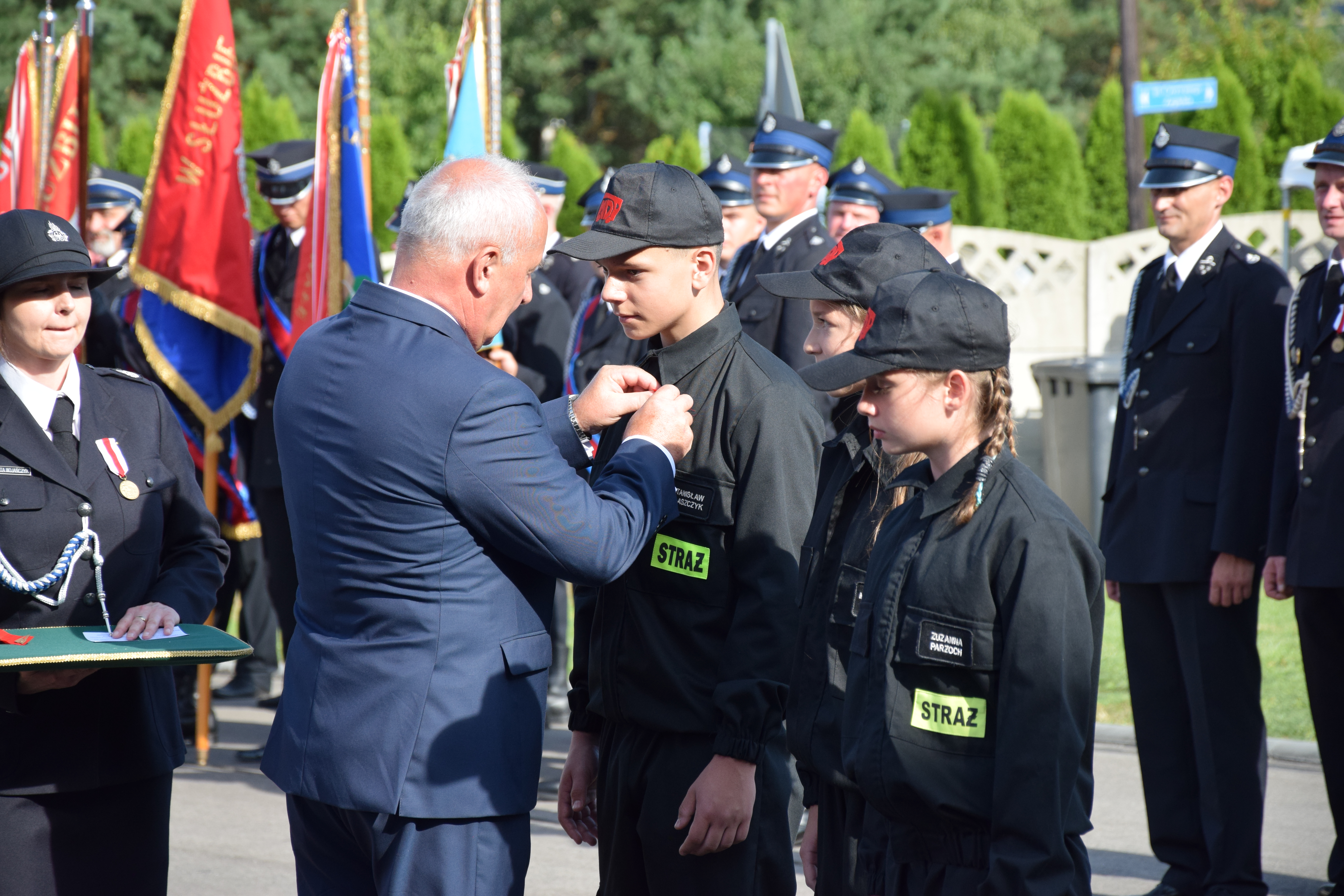 Zdjęcie przedstawia uczestników Jubileuszu 100-lecia OSP Toporowice
