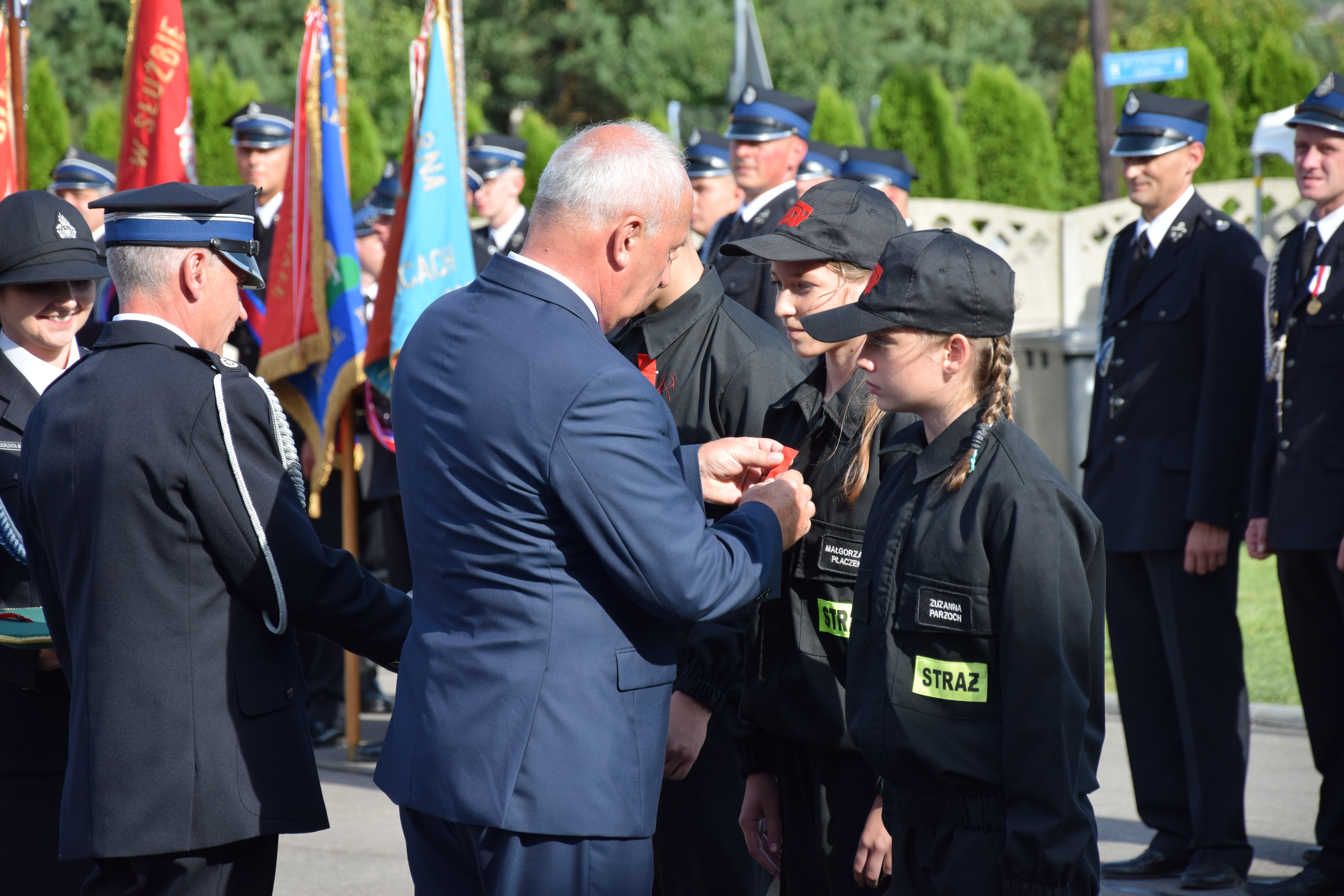 Zdjęcie przedstawia uczestników Jubileuszu 100-lecia OSP Toporowice