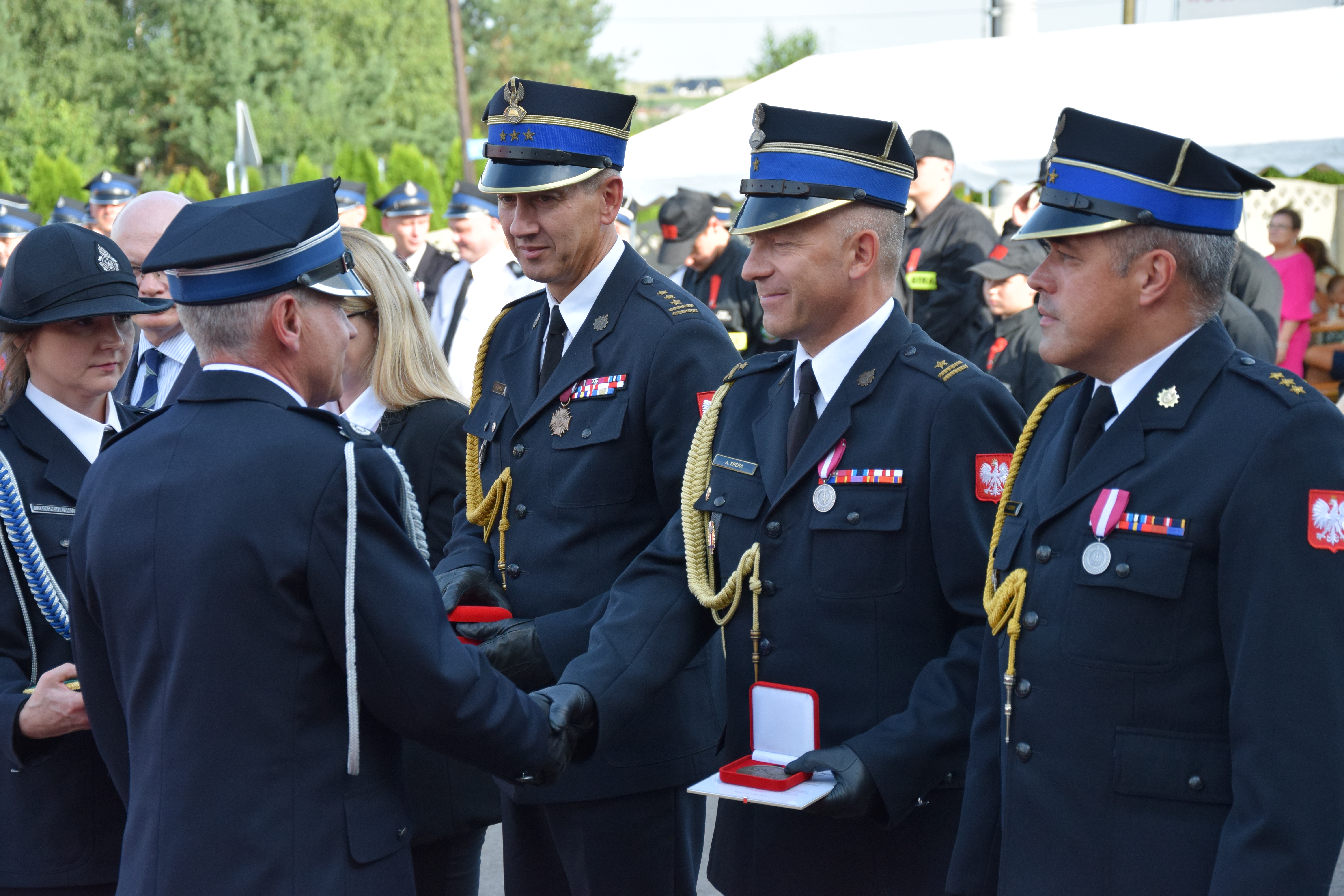 Zdjęcie przedstawia uczestników Jubileuszu 100-lecia OSP Toporowice