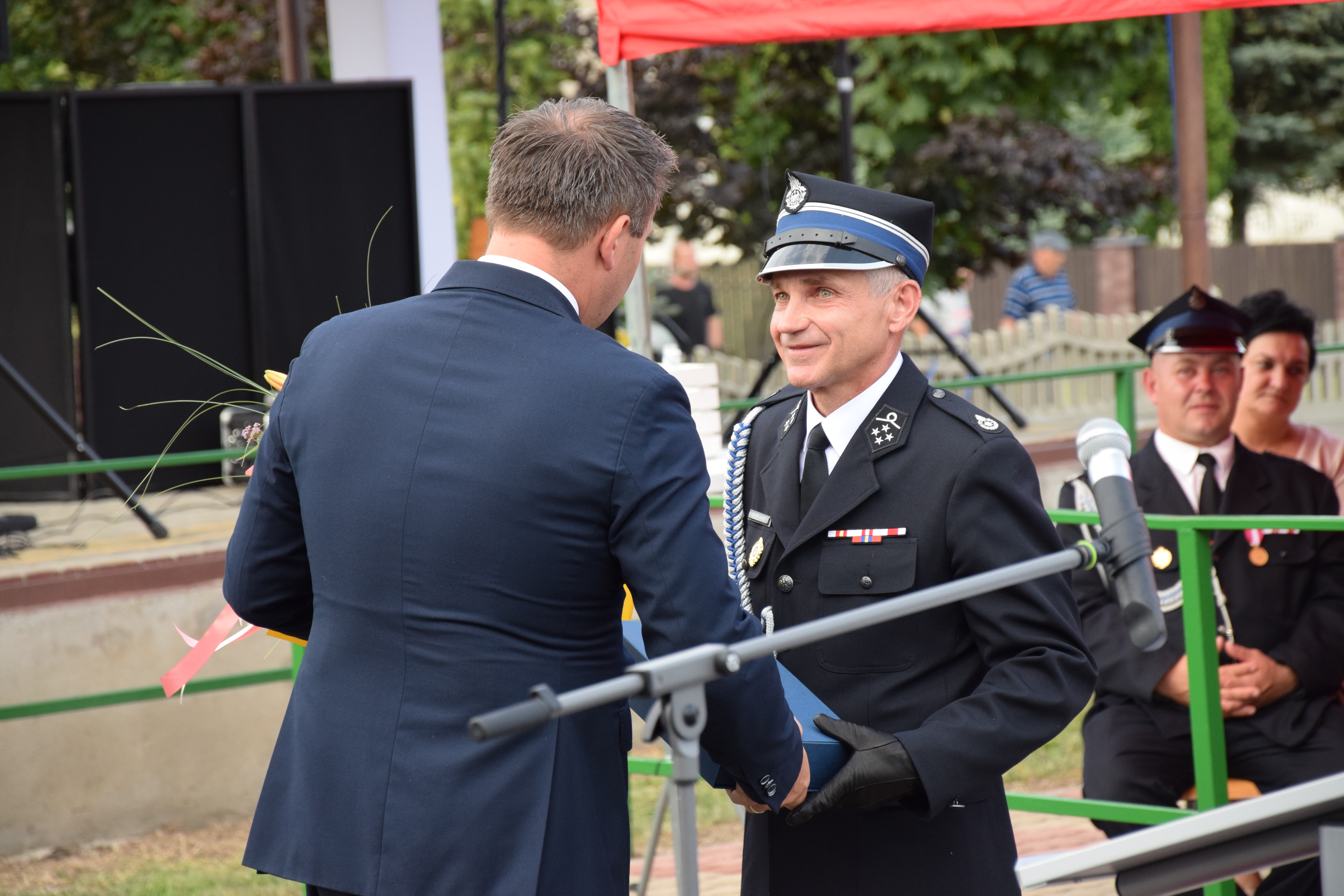 Zdjęcie przedstawia uczestników Jubileuszu 100-lecia OSP Toporowice